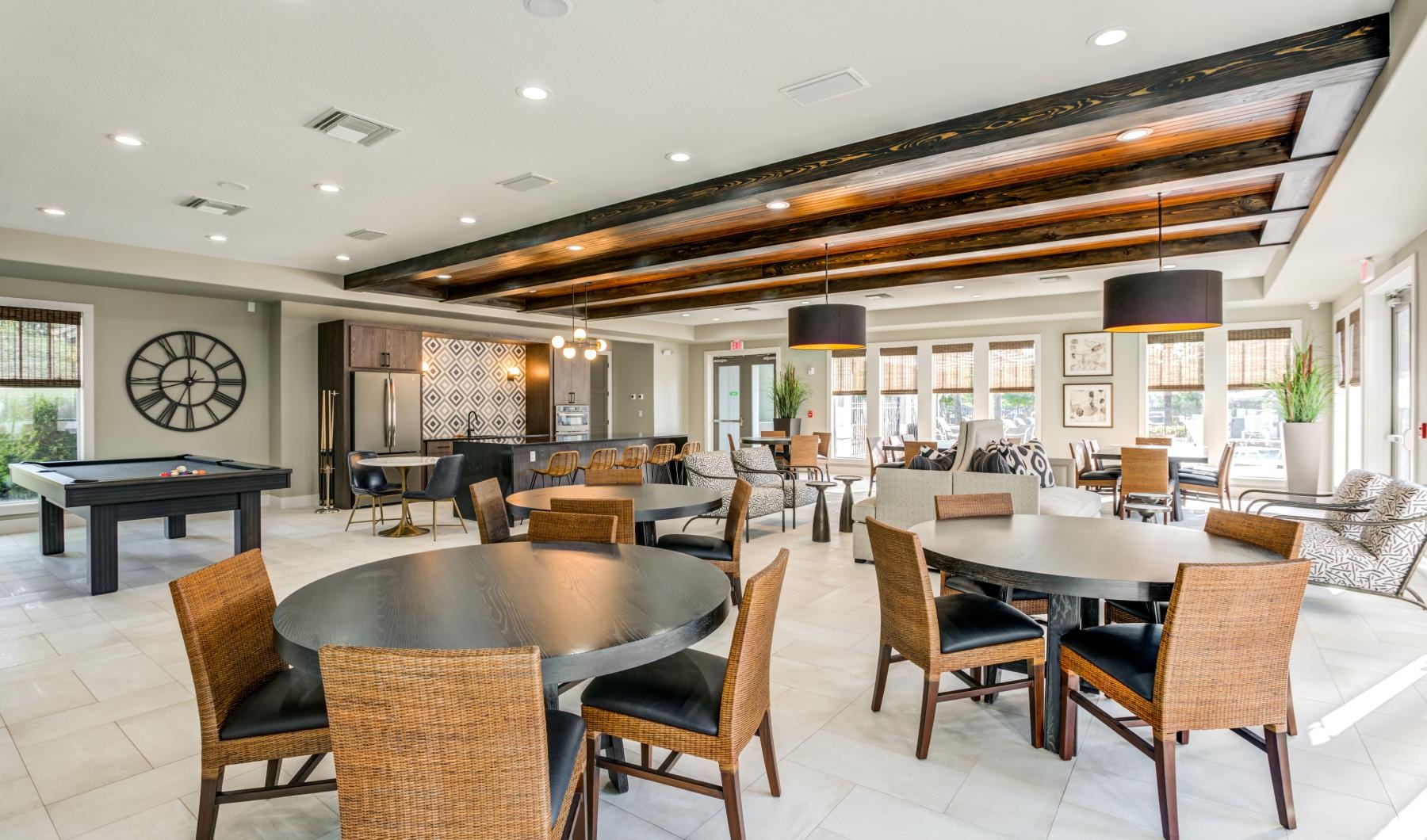 a large room with tables and chairs