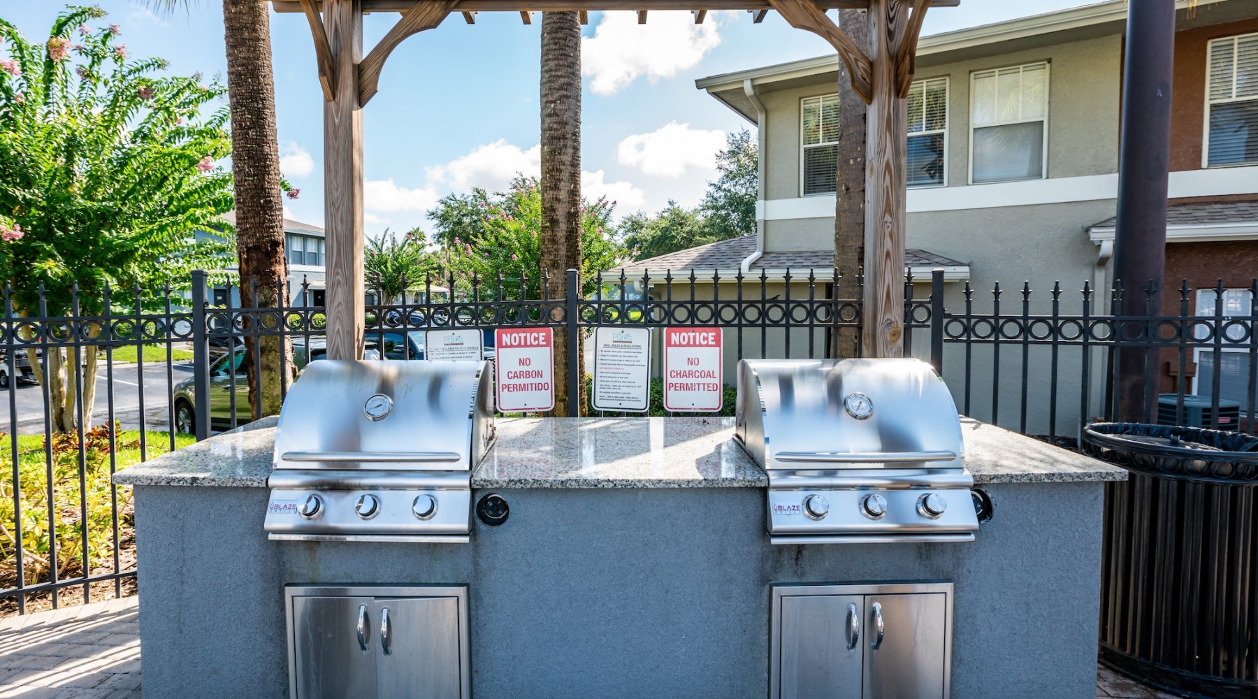 a group of metal bins outside