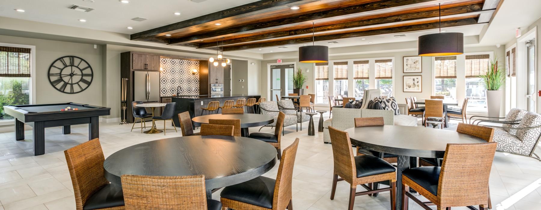 a large room with tables and chairs